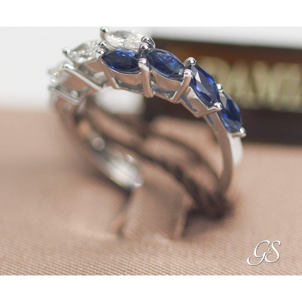 ANELLO DAMIANI DIAMANTI TAGLIO MARQUISE CT.0.56 COLORE H IF ,ZAFFIRI TAGLIO MARQUISE CT.0.93 ,ORO BIANCO GR.4.80.